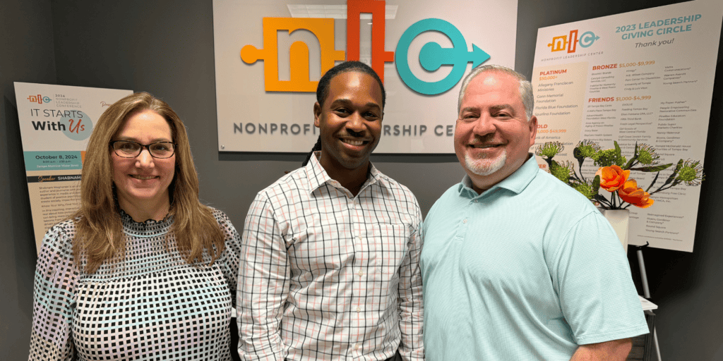 Pictured from left to right: Michelle Sanchez, board chair, Andre Curry and Charlie Imbergamo, CEO of NLC