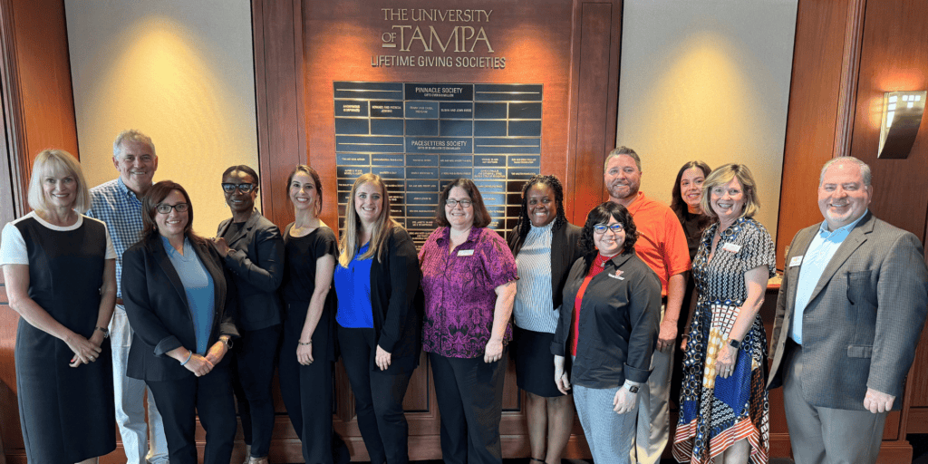 A diverse group of nonprofit professionals in the Class of 2024 Certificate in Nonprofit Management at The University of Tampa