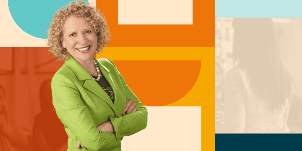 Emily Benham, a white woman with curly blond hair wearing a green jacket stands against a colorful background of shapes in reds, blues, oranges and light peach