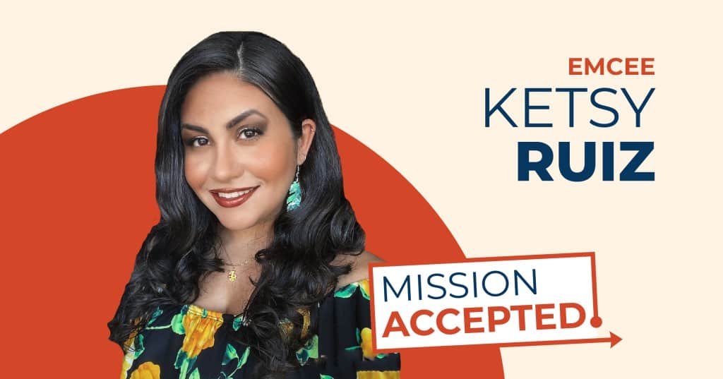 Photo of Ketsy Ruiz, a Latina woman with dark brown hair wearing a floral top and turquoise earrings in front of a background with a red circle