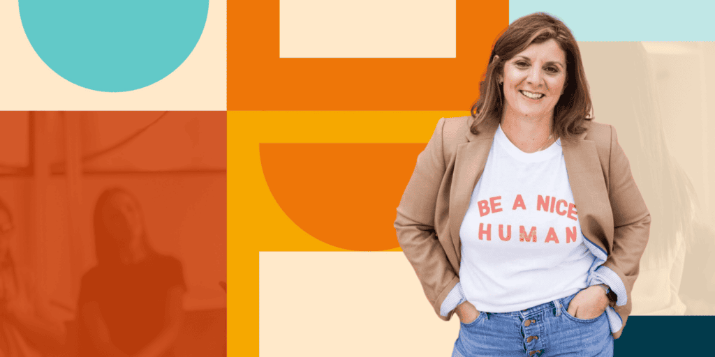 Photo of Kristen Lessig-Schenerlein, a white woman with shoulder-length brown hair wearing a white T-shirt that says Be a Nice Human standing in front of a multi-colored background