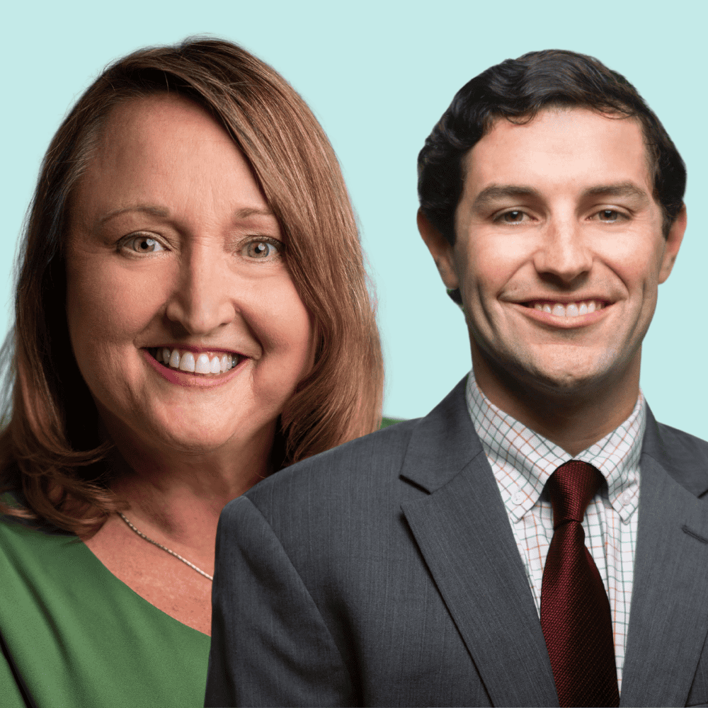 Emily Jones and Michael Azar, two white executives from Warren Averrett wearing business attire