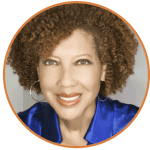 Headshot featuring Kathy Y. Times, a Black woman with short, curly black hair wearing a blue top.