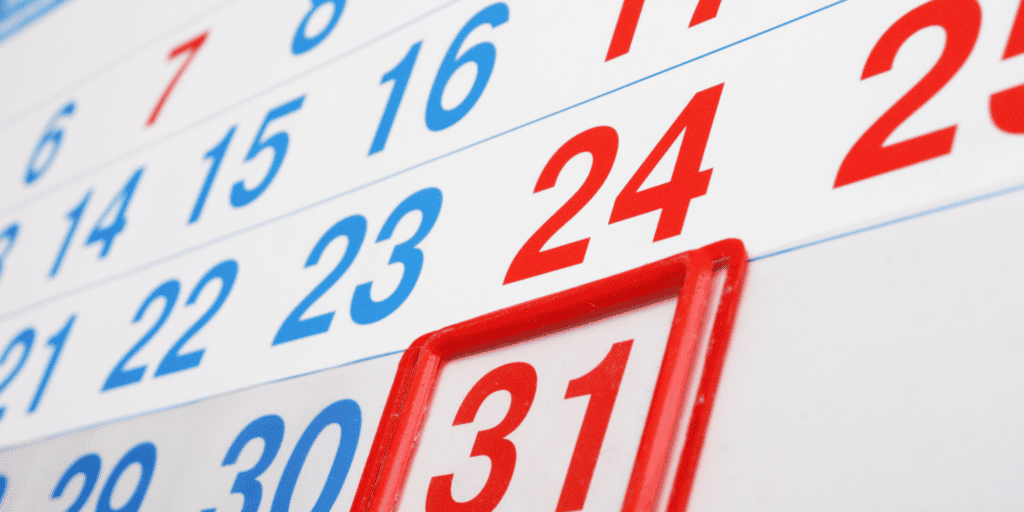 Close-up image of a wall calendar with the 31st day in red and highlighted with a red square